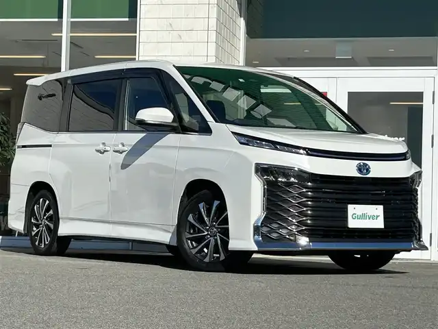 トヨタ ヴォクシー ハイブリッド S－Z 兵庫県 2022(令4)年 4.7万km ホワイトパールクリスタルシャイン 純正ディスプレイオーディオ（ナビ付）/Bluetoothオーディオ/フルセグTV/バックカメラ/ビルトインETC2.0/前後ドライブレコーダー/シートヒーター/クルーズコントロール/ステアリングヒーター/両側パワースライドドア/デジタルインナーミラー/ライトレベライザー/純正フロアマット