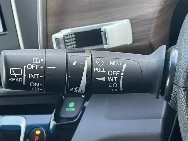 ホンダ フリード ハイブリット G ホンダセンシング 岡山県 2020(令2)年 6.9万km クリスタルブラックパール 登録時走行距離：　68766km/ワンオーナー/禁煙車/純正SDナビ(型番：VXM-204VFi)/　(CD/DVD/フルセグTV/Bluetooth)/バックカメラ/クルーズコントロール(追従走行あり)/衝突被害軽減システム/車線逸脱警報/先行車発進お知らせ機能/ETC/両側パワースライドドア/シートヒーター/ステアリングスイッチ/純正LEDヘッドライト/フォグライト/オートライト/プッシュスタート/スマートキー/アイドリングストップ/ドアバイザー/ウインカーミラー/電動格納ミラー/純正フロアマット/横滑防止装置/盗難防止装置/取扱説明書/新車時整備手帳（保証書）