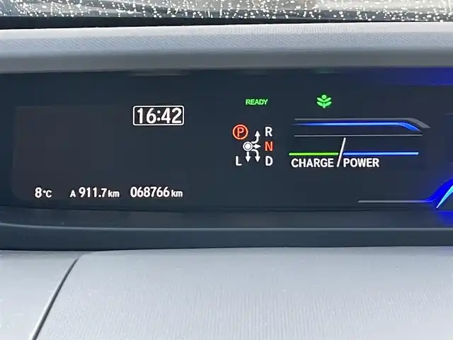 ホンダ フリード ハイブリット G ホンダセンシング 岡山県 2020(令2)年 6.9万km クリスタルブラックパール 登録時走行距離：　68766km/ワンオーナー/禁煙車/純正SDナビ(型番：VXM-204VFi)/　(CD/DVD/フルセグTV/Bluetooth)/バックカメラ/クルーズコントロール(追従走行あり)/衝突被害軽減システム/車線逸脱警報/先行車発進お知らせ機能/ETC/両側パワースライドドア/シートヒーター/ステアリングスイッチ/純正LEDヘッドライト/フォグライト/オートライト/プッシュスタート/スマートキー/アイドリングストップ/ドアバイザー/ウインカーミラー/電動格納ミラー/純正フロアマット/横滑防止装置/盗難防止装置/取扱説明書/新車時整備手帳（保証書）