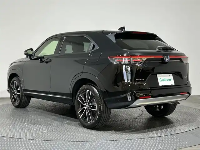 ホンダ ヴェゼル ハイブリッド e:HEV Z 愛媛県 2025(令7)年 0.1万km クリスタルブラックパール ・Honda SENSING	/・ブラインドスポットインフォメーション/・アダプティブドライビングビーム(ADB)/ ・Honda CONNECT for Gathers＋ナビ装着用スペシャルパッケージ/（フルセグTV・BT・FM・AM・applecarplay・android auto・USB）/・運転席助手席シートヒーター/・ハンズフリーアクセスパワーテールゲート(予約クローズ機能付)/・LEDシーケンシャルターンシグナルランプ/・18インチアルミホイール/・コンビシート/・本革巻きステアリング/・衝突軽減ブレーキ/・レーダークルーズコントロール/・オートマチックハイビーム/・ステアリングヒーター/・スペアキー