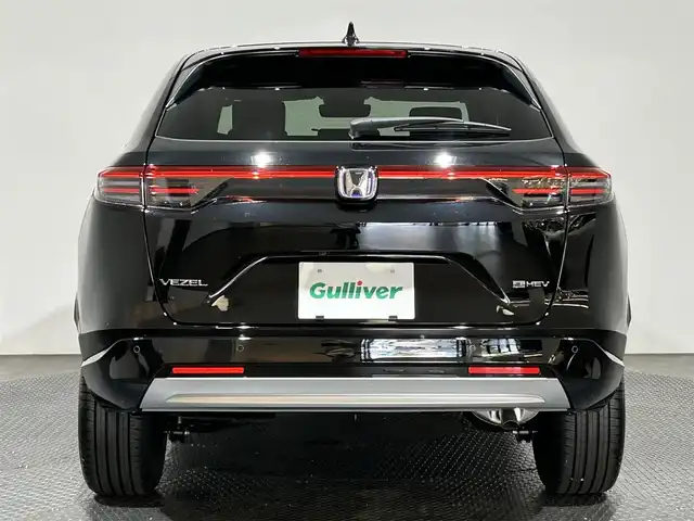 ホンダ ヴェゼル ハイブリッド e:HEV Z 愛媛県 2025(令7)年 0.1万km クリスタルブラックパール ・Honda SENSING	/・ブラインドスポットインフォメーション/・アダプティブドライビングビーム(ADB)/ ・Honda CONNECT for Gathers＋ナビ装着用スペシャルパッケージ/（フルセグTV・BT・FM・AM・applecarplay・android auto・USB）/・運転席助手席シートヒーター/・ハンズフリーアクセスパワーテールゲート(予約クローズ機能付)/・LEDシーケンシャルターンシグナルランプ/・18インチアルミホイール/・コンビシート/・本革巻きステアリング/・衝突軽減ブレーキ/・レーダークルーズコントロール/・オートマチックハイビーム/・ステアリングヒーター/・スペアキー