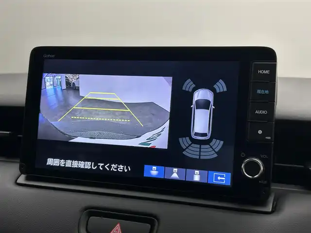 ホンダ ヴェゼル ハイブリッド e:HEV Z 愛媛県 2025(令7)年 0.1万km クリスタルブラックパール ・Honda SENSING	/・ブラインドスポットインフォメーション/・アダプティブドライビングビーム(ADB)/ ・Honda CONNECT for Gathers＋ナビ装着用スペシャルパッケージ/（フルセグTV・BT・FM・AM・applecarplay・android auto・USB）/・運転席助手席シートヒーター/・ハンズフリーアクセスパワーテールゲート(予約クローズ機能付)/・LEDシーケンシャルターンシグナルランプ/・18インチアルミホイール/・コンビシート/・本革巻きステアリング/・衝突軽減ブレーキ/・レーダークルーズコントロール/・オートマチックハイビーム/・ステアリングヒーター/・スペアキー