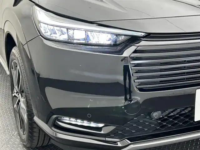 ホンダ ヴェゼル ハイブリッド e:HEV Z 愛媛県 2025(令7)年 0.1万km クリスタルブラックパール ・Honda SENSING	/・ブラインドスポットインフォメーション/・アダプティブドライビングビーム(ADB)/ ・Honda CONNECT for Gathers＋ナビ装着用スペシャルパッケージ/（フルセグTV・BT・FM・AM・applecarplay・android auto・USB）/・運転席助手席シートヒーター/・ハンズフリーアクセスパワーテールゲート(予約クローズ機能付)/・LEDシーケンシャルターンシグナルランプ/・18インチアルミホイール/・コンビシート/・本革巻きステアリング/・衝突軽減ブレーキ/・レーダークルーズコントロール/・オートマチックハイビーム/・ステアリングヒーター/・スペアキー