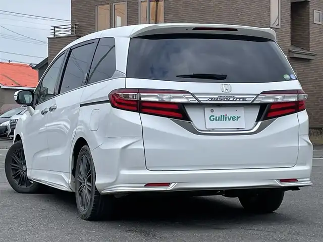 ホンダ オデッセイ アブソルート 20thアニバーサリー 道央・札幌 2014(平26)年 11.1万km ホワイトオーキッドパール 社外メモリーナビ/BT/SD/CD/DVD/社外フリップダウンモニター/衝突被害軽減ブレーキ/横滑り防止装置/クルーズコントロール/ビルトインETC/アイドリングストップ/両側パワースライドドア/D席パワーシート/オットマン/ハーフレザーシート/革巻きステアリング/ステアリングリモコン/パドルシフト/MTモード付AT/レーダー探知機/プッシュスタート/スマートキー/LEDヘッドライト/オートライト/フォグランプ/電動格納ミラー/ヒーテッドドアミラー/ウィンカーミラー/純正フロアマット/スペアキー/社外エンジンスターター