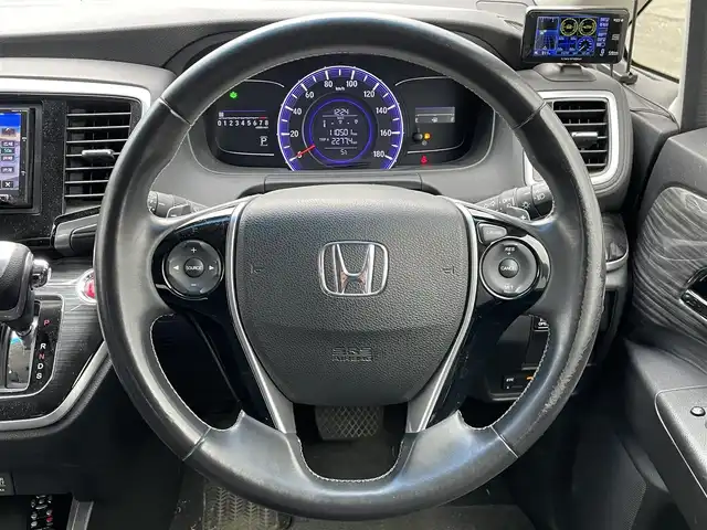 ホンダ オデッセイ アブソルート 20thアニバーサリー 道央・札幌 2014(平26)年 11.1万km ホワイトオーキッドパール 社外メモリーナビ/BT/SD/CD/DVD/社外フリップダウンモニター/衝突被害軽減ブレーキ/横滑り防止装置/クルーズコントロール/ビルトインETC/アイドリングストップ/両側パワースライドドア/D席パワーシート/オットマン/ハーフレザーシート/革巻きステアリング/ステアリングリモコン/パドルシフト/MTモード付AT/レーダー探知機/プッシュスタート/スマートキー/LEDヘッドライト/オートライト/フォグランプ/電動格納ミラー/ヒーテッドドアミラー/ウィンカーミラー/純正フロアマット/スペアキー/社外エンジンスターター