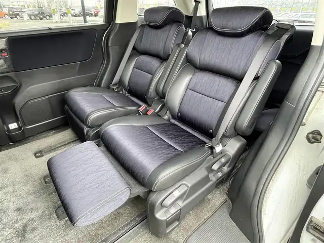 ホンダ オデッセイ アブソルート 20thアニバーサリー 道央・札幌 2014(平26)年 11.1万km ホワイトオーキッドパール 社外メモリーナビ/BT/SD/CD/DVD/社外フリップダウンモニター/衝突被害軽減ブレーキ/横滑り防止装置/クルーズコントロール/ビルトインETC/アイドリングストップ/両側パワースライドドア/D席パワーシート/オットマン/ハーフレザーシート/革巻きステアリング/ステアリングリモコン/パドルシフト/MTモード付AT/レーダー探知機/プッシュスタート/スマートキー/LEDヘッドライト/オートライト/フォグランプ/電動格納ミラー/ヒーテッドドアミラー/ウィンカーミラー/純正フロアマット/スペアキー/社外エンジンスターター