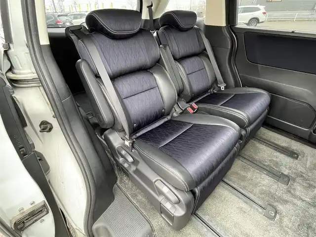 ホンダ オデッセイ アブソルート 20thアニバーサリー 道央・札幌 2014(平26)年 11.1万km ホワイトオーキッドパール 社外メモリーナビ/BT/SD/CD/DVD/社外フリップダウンモニター/衝突被害軽減ブレーキ/横滑り防止装置/クルーズコントロール/ビルトインETC/アイドリングストップ/両側パワースライドドア/D席パワーシート/オットマン/ハーフレザーシート/革巻きステアリング/ステアリングリモコン/パドルシフト/MTモード付AT/レーダー探知機/プッシュスタート/スマートキー/LEDヘッドライト/オートライト/フォグランプ/電動格納ミラー/ヒーテッドドアミラー/ウィンカーミラー/純正フロアマット/スペアキー/社外エンジンスターター