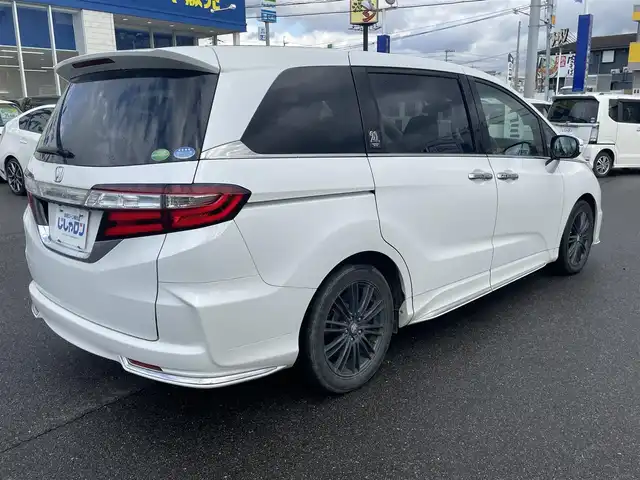 ホンダ オデッセイ アブソルート 20thアニバーサリー 和歌山県 2014(平26)年 11.1万km ホワイトオーキッドパール (株)IDOMが運営する【じしゃロン和歌山店】の自社ローン対象車両になります。こちらは現金ご利用時の価格です。自社ローンご希望の方は別途その旨お申付け下さい。/社外メモリーナビ/BT/SD/CD/DVD/社外フリップダウンモニター/衝突被害軽減ブレーキ/横滑り防止装置/クルーズコントロール/ETC/アイドリングストップ/両側パワースライドドア/D席パワーシート/オットマン/ハーフレザーシート/革巻きステアリング/ステアリングリモコン/パドルシフト/MTモード付AT/レーダー探知機/プッシュスタート/スマートキー/LEDヘッドライト/オートライト/フォグランプ/電動格納ミラー/ヒーテッドドアミラー/ウィンカーミラー/純正フロアマット/スペアキー/社外エンジンスターター