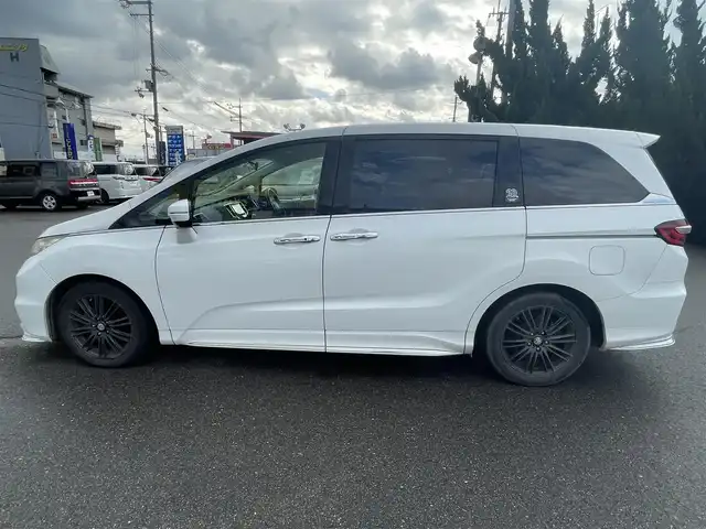 ホンダ オデッセイ アブソルート 20thアニバーサリー 和歌山県 2014(平26)年 11.1万km ホワイトオーキッドパール (株)IDOMが運営する【じしゃロン和歌山店】の自社ローン対象車両になります。こちらは現金ご利用時の価格です。自社ローンご希望の方は別途その旨お申付け下さい。/社外メモリーナビ/BT/SD/CD/DVD/社外フリップダウンモニター/衝突被害軽減ブレーキ/横滑り防止装置/クルーズコントロール/ETC/アイドリングストップ/両側パワースライドドア/D席パワーシート/オットマン/ハーフレザーシート/革巻きステアリング/ステアリングリモコン/パドルシフト/MTモード付AT/レーダー探知機/プッシュスタート/スマートキー/LEDヘッドライト/オートライト/フォグランプ/電動格納ミラー/ヒーテッドドアミラー/ウィンカーミラー/純正フロアマット/スペアキー/社外エンジンスターター