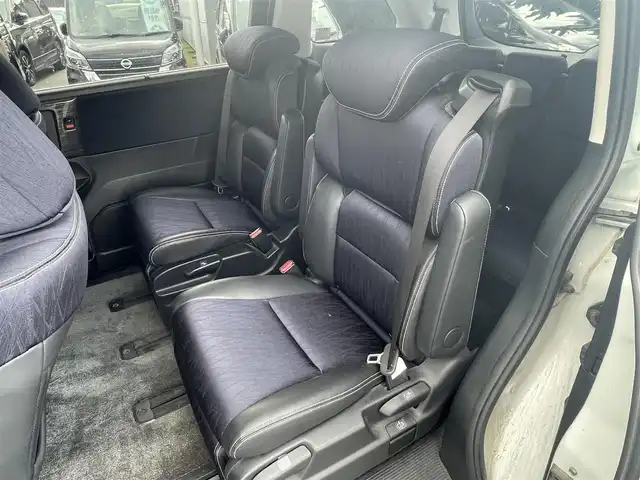 ホンダ オデッセイ アブソルート 20thアニバーサリー 和歌山県 2014(平26)年 11.1万km ホワイトオーキッドパール (株)IDOMが運営する【じしゃロン和歌山店】の自社ローン対象車両になります。こちらは現金ご利用時の価格です。自社ローンご希望の方は別途その旨お申付け下さい。/社外メモリーナビ/BT/SD/CD/DVD/社外フリップダウンモニター/衝突被害軽減ブレーキ/横滑り防止装置/クルーズコントロール/ETC/アイドリングストップ/両側パワースライドドア/D席パワーシート/オットマン/ハーフレザーシート/革巻きステアリング/ステアリングリモコン/パドルシフト/MTモード付AT/レーダー探知機/プッシュスタート/スマートキー/LEDヘッドライト/オートライト/フォグランプ/電動格納ミラー/ヒーテッドドアミラー/ウィンカーミラー/純正フロアマット/スペアキー/社外エンジンスターター