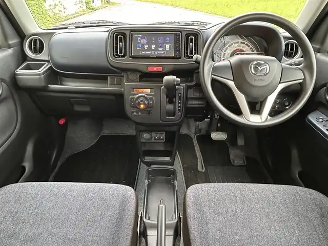 マツダ キャロル ハイブリッドGX 長崎県 2024(令6)年 0.5万km ベージュ ワンオーナー/社外メモリナビ/（CD/DVD/BT/フルセグ）/バックカメラ/衝突軽減ブレーキ/レーンアシスト/シートヒーター/ETC/前後ドライブレコーダー/オートライト/スマートキー/プッシュスタート/純正14インチAW/カラーコード：WBB　ソフトベージュメタリック