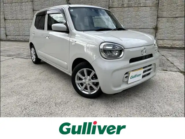 マツダ キャロル ハイブリッドGX 長崎県 2024(令6)年 0.5万km ベージュ ワンオーナー/社外メモリナビ/（CD/DVD/BT/フルセグ）/バックカメラ/衝突軽減ブレーキ/レーンアシスト/シートヒーター/ETC/前後ドライブレコーダー/オートライト/スマートキー/プッシュスタート/純正14インチAW/カラーコード：WBB　ソフトベージュメタリック