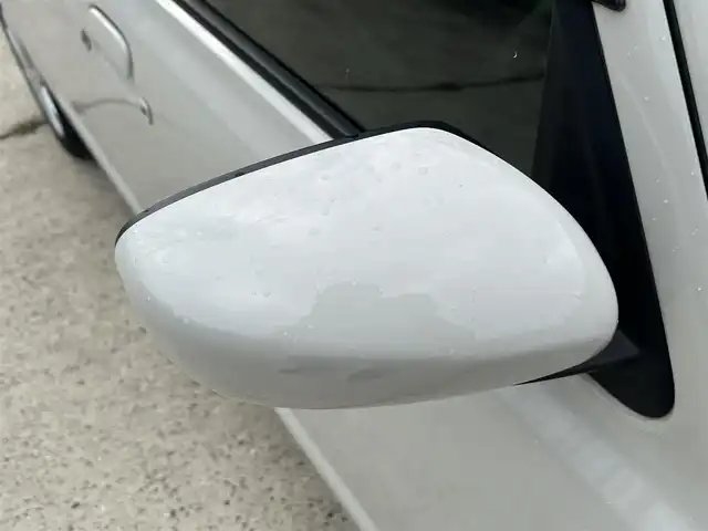 マツダ キャロル ハイブリッドGX 長崎県 2024(令6)年 0.5万km ベージュ ワンオーナー/社外メモリナビ/（CD/DVD/BT/フルセグ）/バックカメラ/衝突軽減ブレーキ/レーンアシスト/シートヒーター/ETC/前後ドライブレコーダー/オートライト/スマートキー/プッシュスタート/純正14インチAW/カラーコード：WBB　ソフトベージュメタリック