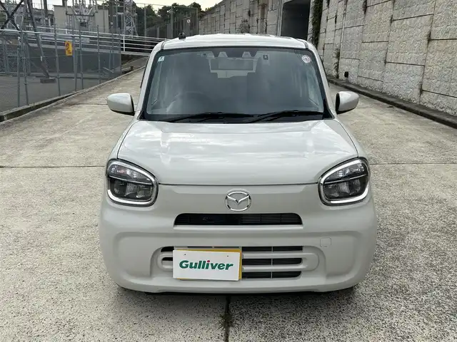 マツダ キャロル ハイブリッドGX 長崎県 2024(令6)年 0.5万km ベージュ ワンオーナー/社外メモリナビ/（CD/DVD/BT/フルセグ）/バックカメラ/衝突軽減ブレーキ/レーンアシスト/シートヒーター/ETC/前後ドライブレコーダー/オートライト/スマートキー/プッシュスタート/純正14インチAW/カラーコード：WBB　ソフトベージュメタリック