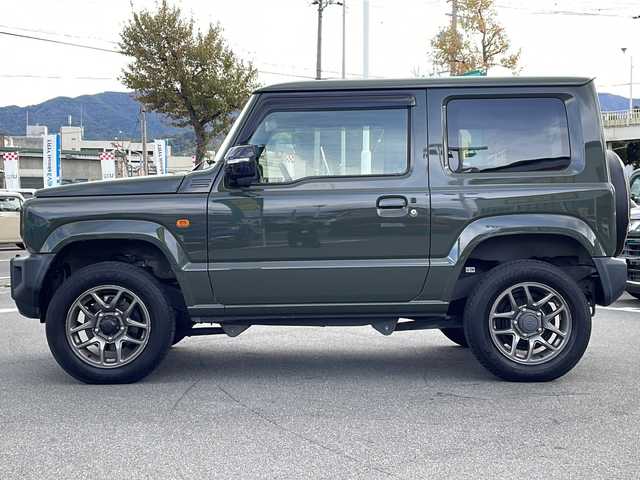 スズキ ジムニー XC 長野県 2018(平30)年 3.6万km ジャングルグリーン 禁煙車/社外7インチナビ/【CN-E300D】/（CD/ワンセグTV/Bluetooth）/セーフティーサポート/・デュアルセンサーブレーキサポート/・誤発進抑制機能/・車線逸脱警報機能/・ふらつき警報機能/・先行車発進お知らせ機能/・標識認識機能/・ハイビームアシスト/ビルトインETC/クルーズコントロール/革巻きステアリング/ステアリングスイッチ/前席シートヒーター/ドライブレコーダー/LEDヘッドライト/フォグランプ/オートライト/スマートキー/Pスタート/電動格納ミラー/純正16インチAW/純正フロアマット/純正ドアバイザー