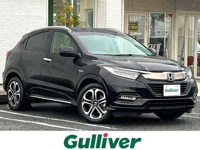ホンダ ヴェゼル ハイブリッド Z ホンダセンシング 千葉県 2020(令2)年 2.1万km クリスタルブラックパール ８インチナビＶＸＭ－２０５ＶＦＥｉ　バックカメラ　純正ドラレコ　ステアスイッチ　追従クルコン　シートヒーター　ジャズブラウンコンビシート　ＨＤＭＩ　ＢＴ　純正１７インチＡＷ　ＬＥＤライト　オートライト/純正８インチＳＤナビ（ＶＸＭ－２０５ＶＦＥｉ）/純正ドラレコ/ステアリングスイッチ/追従クルコン/シートヒーター/ＨＤＭＩ/バックカメラ/カーテンエアバッグ/ＢＴ/純正ＡＷ/ＬＥＤヘッドライト