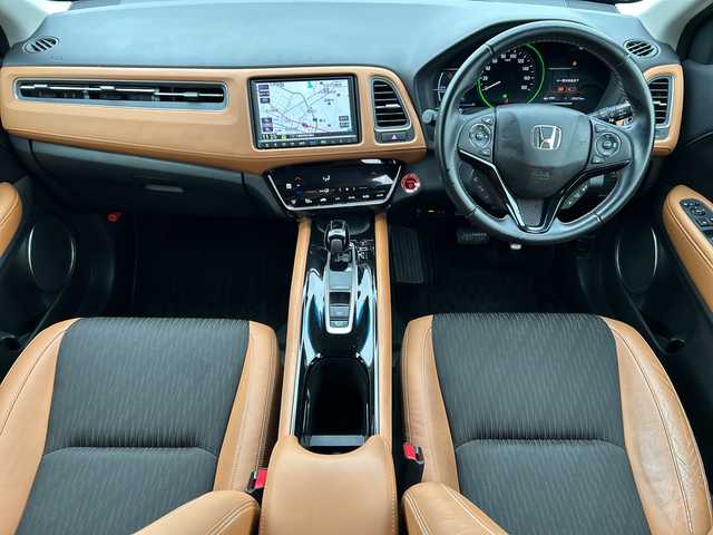 ホンダ ヴェゼル ハイブリッド Z ホンダセンシング 千葉県 2020(令2)年 2.1万km クリスタルブラックパール ８インチナビＶＸＭ－２０５ＶＦＥｉ　バックカメラ　純正ドラレコ　ステアスイッチ　追従クルコン　シートヒーター　ジャズブラウンコンビシート　ＨＤＭＩ　ＢＴ　純正１７インチＡＷ　ＬＥＤライト　オートライト/純正８インチＳＤナビ（ＶＸＭ－２０５ＶＦＥｉ）/純正ドラレコ/ステアリングスイッチ/追従クルコン/シートヒーター/ＨＤＭＩ/バックカメラ/カーテンエアバッグ/ＢＴ/純正ＡＷ/ＬＥＤヘッドライト