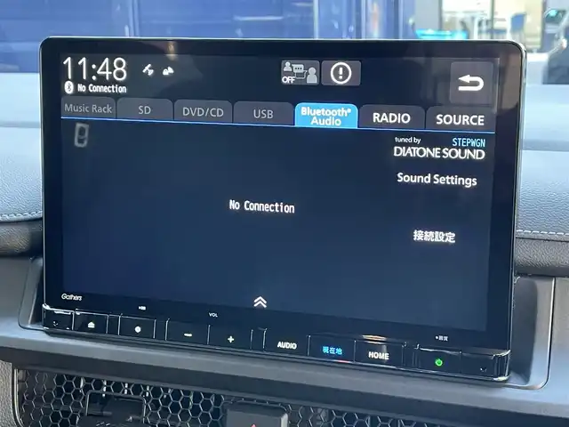 ホンダ ステップワゴン スパーダ eHEV 滋賀県 2025(令7)年 0.1千km クリスタルブラックパール 登録済未使用車/純正11.4インチナビ/【Bluetooth/CD/DVD/フルセグTV/Apple Carplay/Android Auto】/両側パワースライドドア/ハーフレザーシート/バックカメラ/ホンダセンシング/・衝突軽減ブレーキ/・先行車発進お知らせ機能/・歩行者事故低減ステアリング/・路外逸脱抑制機能/・標識認識機能/・渋滞追従機能付アダプティブクルーズコントロール/・車線維持支援システム/・トラフィックジャムアシスト（渋滞運転支援機能）/・ブラインドスポットインフォメーション/・誤発進抑制機能/・後方誤発進抑制機能/・近距離衝突軽減ブレーキ/・急アクセル抑制機能/・パーキングセンサーシステム/・オートハイビーム/・アダプティブドライビングビーム/LEDヘッドライト/パワーバックドア/D/Nシートヒーター/二列目オットマン/後席サンシェード/パドルシフト/プッシュスタート/スマートキー/ステアリングリモコン