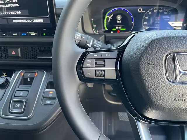 ホンダ ステップワゴン スパーダ eHEV 滋賀県 2025(令7)年 0.1千km クリスタルブラックパール 登録済未使用車/純正11.4インチナビ/【Bluetooth/CD/DVD/フルセグTV/Apple Carplay/Android Auto】/両側パワースライドドア/ハーフレザーシート/バックカメラ/ホンダセンシング/・衝突軽減ブレーキ/・先行車発進お知らせ機能/・歩行者事故低減ステアリング/・路外逸脱抑制機能/・標識認識機能/・渋滞追従機能付アダプティブクルーズコントロール/・車線維持支援システム/・トラフィックジャムアシスト（渋滞運転支援機能）/・ブラインドスポットインフォメーション/・誤発進抑制機能/・後方誤発進抑制機能/・近距離衝突軽減ブレーキ/・急アクセル抑制機能/・パーキングセンサーシステム/・オートハイビーム/・アダプティブドライビングビーム/LEDヘッドライト/パワーバックドア/D/Nシートヒーター/二列目オットマン/後席サンシェード/パドルシフト/プッシュスタート/スマートキー/ステアリングリモコン
