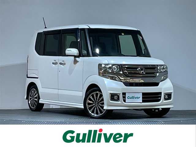 ホンダ Ｎ ＢＯＸ カスタム G ターボ Lパッケージ 愛知県 2015(平27)年 6.7万km プレミアムホワイトパールⅡ MITSUBISHI製メモリナビ/オートライト/ECONスイッチ/パドルシフト/純正フロアマット/ドアバイザー/CTBA/ドアロック連動ミラー/ステアリングスイッチ/ETC/両側パワースライドドア/革巻きステアリング