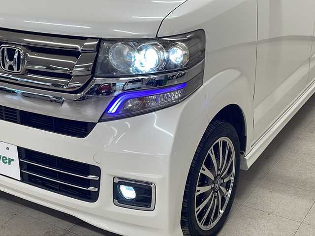 ホンダ Ｎ ＢＯＸ カスタム G ターボ Lパッケージ 熊本県 2015(平27)年 6.7万km プレミアムホワイトパールⅡ MITSUBISHI製メモリナビ/オートライト/ECONスイッチ/パドルシフト/純正フロアマット/ドアバイザー/CTBA/ドアロック連動ミラー/ステアリングスイッチ/ETC/両側パワースライドドア/革巻きステアリング