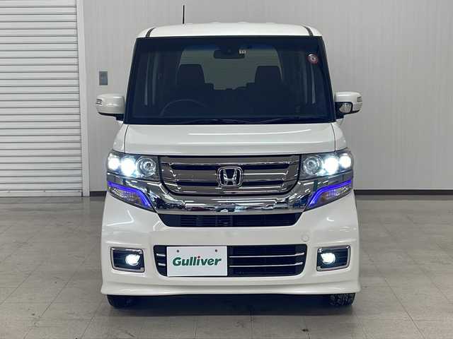 ホンダ Ｎ ＢＯＸ カスタム G ターボ Lパッケージ 熊本県 2015(平27)年 6.7万km プレミアムホワイトパールⅡ MITSUBISHI製メモリナビ/オートライト/ECONスイッチ/パドルシフト/純正フロアマット/ドアバイザー/CTBA/ドアロック連動ミラー/ステアリングスイッチ/ETC/両側パワースライドドア/革巻きステアリング