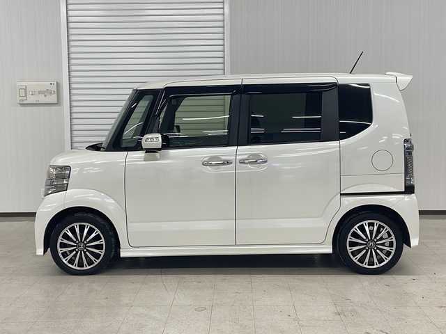 ホンダ Ｎ ＢＯＸ カスタム G ターボ Lパッケージ 熊本県 2015(平27)年 6.7万km プレミアムホワイトパールⅡ MITSUBISHI製メモリナビ/オートライト/ECONスイッチ/パドルシフト/純正フロアマット/ドアバイザー/CTBA/ドアロック連動ミラー/ステアリングスイッチ/ETC/両側パワースライドドア/革巻きステアリング