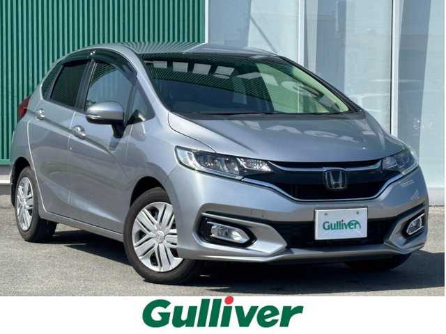 ホンダ フィット 13G L ホンダセンシング 福岡県 2017(平29)年 1.7万km ルナシルバーM ホンダセンシング/盗難防止システム/レーンキープアシスト/コーナーセンサー/エアバック（W＋サイド）/純正ナビ/バック車外カメラ/ビルドインETC/USB接続/ミュージックプレイヤー接続（ipod.AppleCarPlay）/bluetooth/フルセグTV/12V180WMAXソケット/純正フロアマット/フルフラットシート/オートマッチクハイビーム/アイドリングストップ