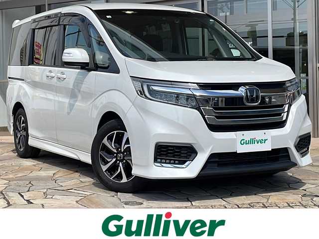 ホンダ ステップワゴン スパーダ ホンダセンシング 静岡県 2018(平30)年 5.4万km プラチナホワイトパール 純正ナビ/・CD/DVD/・SD/・Bluetooth/・USB/・フルセグTV/・Music Rack/・iPod/ホンダセンシング/●衝突軽減ブレーキ〈CMBS〉/●誤発進抑制機能/●歩行者事故低減ステアリング/●路外逸脱抑制機能/●ACC〈アダプティブ・クルーズ・コントロール〉/●LKAS〈車線維持支援システム〉/●先行車発進お知らせ機能/●標識認識機能/主要装備/・バックカメラ/・前後ドライブレコーダー/・後席フリップダウンモニター/・両側パワースライドドア/・ＬＥＤヘッドライト/・パドルシフト/・アイドリングストップ/・純正１６インチＡＷ/・わくわくゲート
