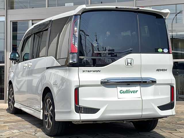 ホンダ ステップワゴン スパーダ ホンダセンシング 静岡県 2018(平30)年 5.4万km プラチナホワイトパール 純正ナビ/・CD/DVD/・SD/・Bluetooth/・USB/・フルセグTV/・Music Rack/・iPod/ホンダセンシング/●衝突軽減ブレーキ〈CMBS〉/●誤発進抑制機能/●歩行者事故低減ステアリング/●路外逸脱抑制機能/●ACC〈アダプティブ・クルーズ・コントロール〉/●LKAS〈車線維持支援システム〉/●先行車発進お知らせ機能/●標識認識機能/主要装備/・バックカメラ/・前後ドライブレコーダー/・後席フリップダウンモニター/・両側パワースライドドア/・ＬＥＤヘッドライト/・パドルシフト/・アイドリングストップ/・純正１６インチＡＷ/・わくわくゲート