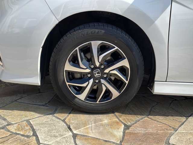 ホンダ ステップワゴン スパーダ ホンダセンシング 静岡県 2018(平30)年 5.4万km プラチナホワイトパール 純正ナビ/・CD/DVD/・SD/・Bluetooth/・USB/・フルセグTV/・Music Rack/・iPod/ホンダセンシング/●衝突軽減ブレーキ〈CMBS〉/●誤発進抑制機能/●歩行者事故低減ステアリング/●路外逸脱抑制機能/●ACC〈アダプティブ・クルーズ・コントロール〉/●LKAS〈車線維持支援システム〉/●先行車発進お知らせ機能/●標識認識機能/主要装備/・バックカメラ/・前後ドライブレコーダー/・後席フリップダウンモニター/・両側パワースライドドア/・ＬＥＤヘッドライト/・パドルシフト/・アイドリングストップ/・純正１６インチＡＷ/・わくわくゲート