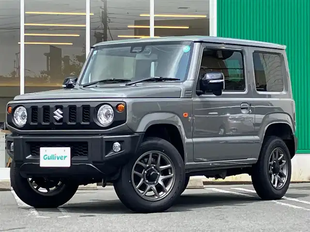 スズキ ジムニー XC 静岡県 2024(令6)年 0.2万km ミディアムグレー エンジンスタートボタン/パワーステアリング/パワーウィンドウ/アイドリングストップ/スマートキー/オートエアコン/クルーズコントロール/8インチナビ（CD/DVD/BT/フルセグ）/ドライブレコーダー全方位/純正フロアマット/純正アルミホイール/D席N席シートヒーター/背面タイヤ/ABS/横滑り防止装置/コーナーセンサー/センターデフロック/レーンキープアシスト/オートライト/オートマチックハイビーム/ダウンヒルアシストコントロール/LEDヘッドライト/W＋サイドエアバック/衝突軽減システム