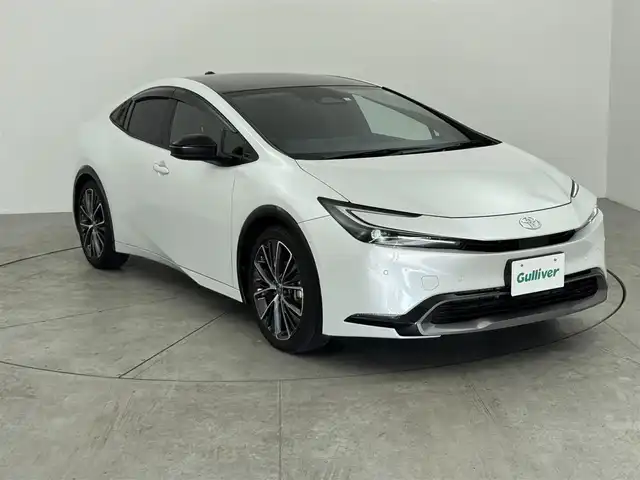 トヨタ プリウス Z 愛知県 2023(令5)年 4.1万km ホワイトパールクリスタルシャイン トヨタセーフティーセンス/・オートマチックハイビーム/・プリクラッシュセーフティー/・レーンアシスト/・レーンディパラーチャー/・ロードサインアシスト/・先行発進警告システム/・レーダークルーズコントロール/・BSM/・クリアランスソナー/12.3インチディスプレイオーディオ/・フルセグTV/・Bluetooth/・AppleCarPlay/パノラマルーフ/置くだけ充電/ETC2.0/パワーバックドア/革巻きステアリング/デジタルインナーミラー/シートヒーター/エアシート/電動パーキングシステム/AC100V/パワーシート