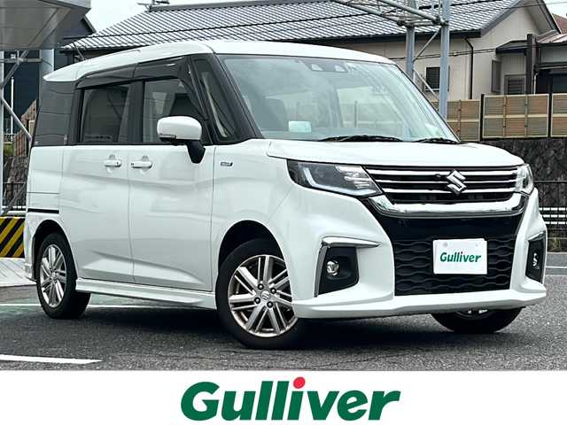 スズキ ソリオ HV MZ 愛知県 2022(令4)年 3.5万km ピュアホワイトP /禁煙車//ワンオーナー//純正ナビ・フルセグTV//全方位モニター//ETC//両側パワースライドドア//LEDオートライト//スズキセーフティサポート//前後ドライブレコーダー//アイドリングストップ//ステアスイッチ//前席シートヒーター//電動格納ミラーウインカー//デュアルカメラブレーキサポート//前後誤発進抑制制御//車線逸脱警報//ふらつき警報//先行車発進お知らせ//ハイビームアシスト//ACC//ドアバイザー//純正１５インチアルミ//純正フロアマット//新車保証書/取扱説明書//スペアキー
