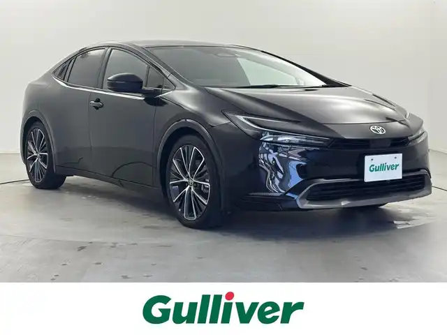 トヨタ プリウス Z 福井県 2023(令5)年 2万km アティチュードブラックマイカ 純正ディスプレイオーディオ　/アラウンドビューモニター/ガラスルーフ　/デジタルインナーミラー /ビルトインETC2.0/アダプティブクルーズコントロール　/トヨタセーフティーセンス　/置くだけ充電　/電動リアゲート　/電動パーキングブレーキ　/エアーシート/シートヒーター /ステアリングヒーター/運転席パワーシート/純正フォグ
