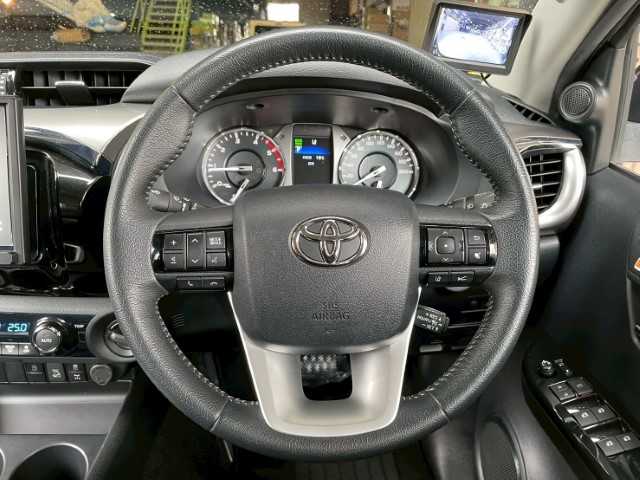 トヨタ ハイラックス Z 道北・旭川 2021(令3)年 4.3万km オキサイドブロンズM USトヨタ タコマルックグリル（社外）/リフトアップキット（社外）/ATOTOディスプレイオーディオ（社外）/バックカメラ/社外ベッドライナー（MAX LINER）/マッドフラップ（社外）/リアデフロック/プリクラッシュセーフティ/LDA/DAC/ETC/クルーズコントロール/アイドリングストップ/コーナーセンサー/4WD(切替）/フォグランプ（フロント、リア）/電格ミラー/17AW RAYS M9+（社外）/ダンロップ　グラントレックR/T 01（社外）/ GRフロントバンパ-（純正）/フェンダートリム（純正）/フロントカメラ＋モニターセット（社外）/社外パーツ取付有