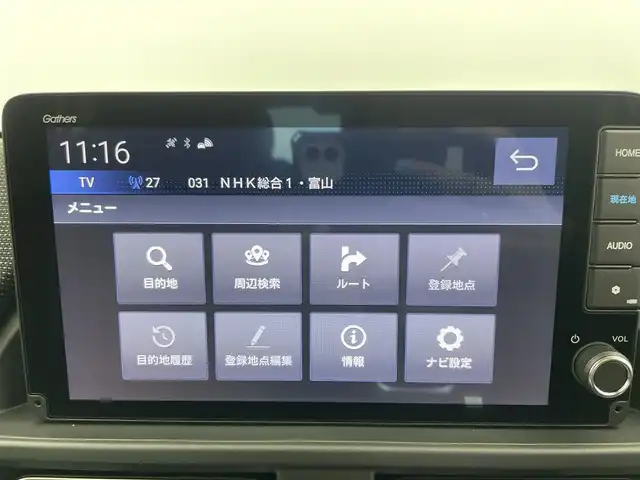 ホンダ フリード ハイブリット e:HEV AIR EX 富山県 2025(令7)年 0.1千km プラチナホワイトパール 登録済未使用車/4WD/純正9型ナビ（AM/FM/BT/USB/フルセグ）/バックカメラ/両側パワースライドドア/オートホールド付電子パーキング/ハーフレザーシート/シートヒーター/ブラインドスポットモニター/衝突被害軽減システム/レーダークルーズコントロール/レーンキープアシスト/コーナーセンサー/横滑り防止装置/純正アルミホイール/オートLEDライト/革巻きステアリング/ステアリングスイッチ