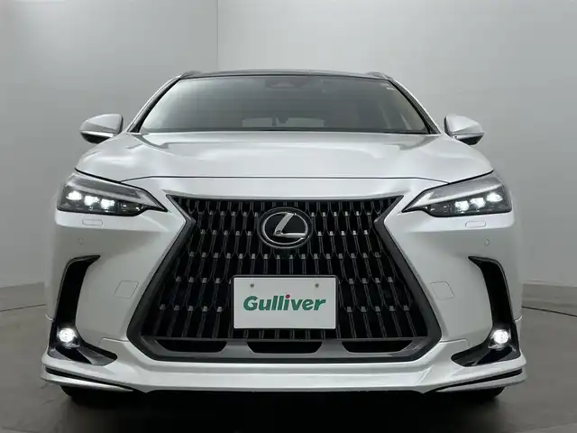 レクサス ＮＸ 350h バージョンL 岡山県 2023(令5)年 1.5万km ソニッククォーツ モデリスタエアロ（前・横・後下）/パノラマルーフ/レザーシート/純正14インチディスプレイオーディオ/　【ナビ/フルセグ/BT/Carplay】/デジタルインナーミラー/置くだけ充電/ルーフレール/100V電源/ブラインドスポットモニター/パノラミックビューモニター/追従型クルーズコントロール/オートハイビーム/三眼LEDヘッドライト（AUTO機能付き）/ビルトインETC2.0/全席シートヒーター/前席エアシート/前席パワーシート/電動リアゲート/衝突軽減ブレーキシステム/社外ドライブレコーダー（前後）　TZ-D305W/純正２０インチアルミホイール/コーナーセンサー（前後）/プッシュスタート/スマートキー×1/カードキー×1/取扱説明書