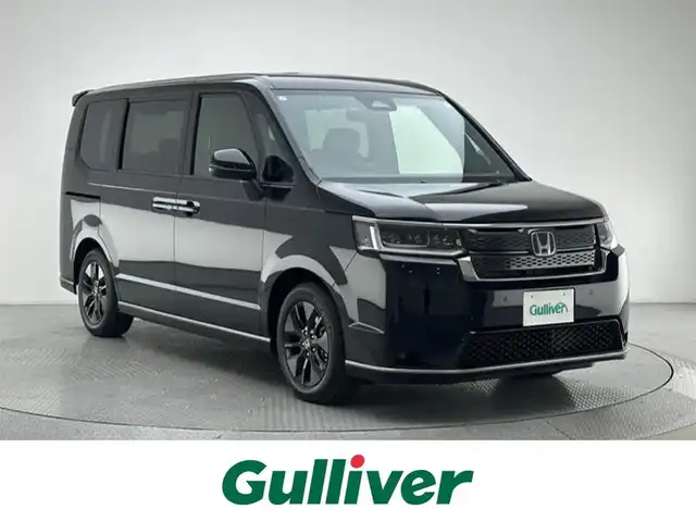 ホンダ ステップワゴン スパーダ eHEV 兵庫県 2025(令7)年 0.1千km クリスタルブラックパール 登録済未使用車/純正ナビ(CD/DVD/フルセグTV/Bluetooth）/バックカメラ/両側パワースライドドア/レーダークルーズコントロール/ハーフレザーシート/前後コーナーセンサー/電動リアゲート/衝突軽減システム/BSM/純正アルミホイール/LEDヘッドライト/オートライト/オートハイビーム