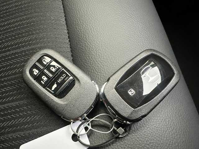 ホンダ ステップワゴン スパーダ eHEV 兵庫県 2025(令7)年 0.1千km クリスタルブラックパール 登録済未使用車/純正ナビ(CD/DVD/フルセグTV/Bluetooth）/バックカメラ/両側パワースライドドア/レーダークルーズコントロール/ハーフレザーシート/前後コーナーセンサー/電動リアゲート/衝突軽減システム/BSM/純正アルミホイール/LEDヘッドライト/オートライト/オートハイビーム