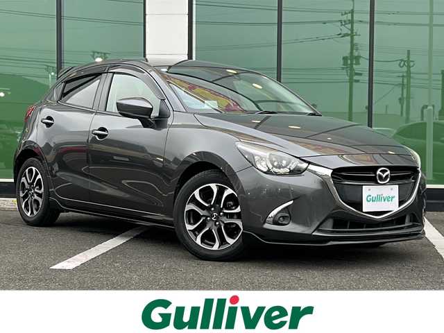 マツダ デミオ XD ツーリング 福岡県 2017(平29)年 6.3万km マシーングレープレミアムM 純正ナビ/（Bluetooth/フルセグTV/CD/DVD/AM/FM）/ターボ/クルーズコントロール/シートヒーター/i-stop/オートライト/LEDヘッドライト/HUD/純正アルミホイール/純正フロアマット/ETC/スペアキー