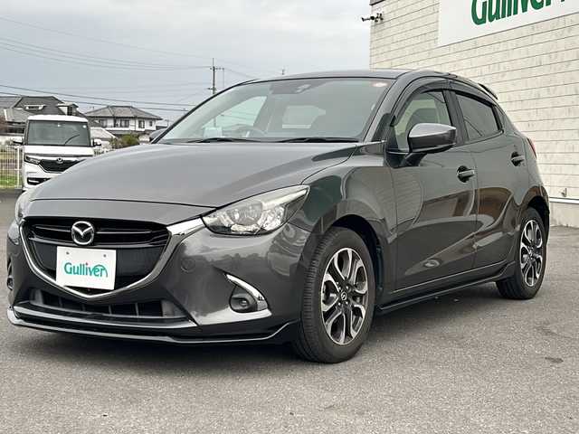 マツダ デミオ XD ツーリング 福岡県 2017(平29)年 6.3万km マシーングレープレミアムM 純正ナビ/（Bluetooth/フルセグTV/CD/DVD/AM/FM）/ターボ/クルーズコントロール/シートヒーター/i-stop/オートライト/LEDヘッドライト/HUD/純正アルミホイール/純正フロアマット/ETC/スペアキー