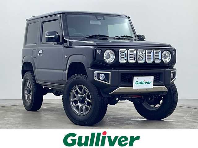 スズキ ジムニー XC 秋田県 2024(令6)年 0.1万km ブルーイッシュブラックパール3 ４WD/9インチディスプレイオーディオ /ワンオーナー　/３インチリフトアップ　/シーケンシャルLEDテールランプ　/２色切り替えLEDフォグランプ　/リアパーキングセンサー　/LEDウィンカー　/ウィンカーミラー /スマートキー/プッシュスタート /アイドリングストップ/オートライト/オートエアコン /クリアランスソナー /ヒルディセンスコントロール/衝突被害軽減システム/横滑り防止装置/クルーズコントロール/レーンキープアシスト/前席シートヒーター/USBポート/革巻きステアリング/黒革調シートカバー/純正フロアマット/LED室内灯/社外タイヤカバー/リアガラスフィルム施工/取扱説明書/保証書/サイドバイザー /コーナーセンサー /電格ミラー