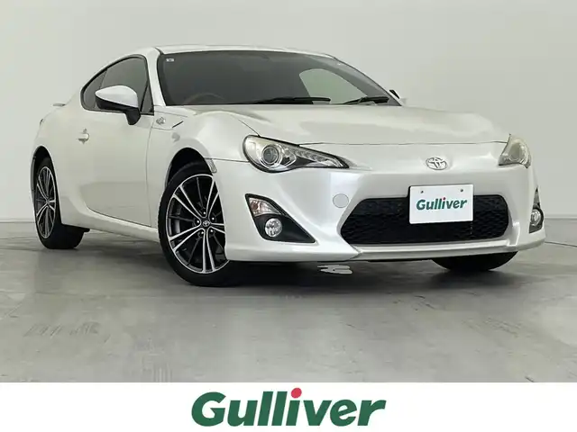 トヨタ ８６ GT リミテッド 群馬県 2012(平24)年 5.8万km サテンホワイトパール 社外ナビ（AVIC-ZH99）/　フルセグTV/Bluetooth/MSV/FM/AM/ETC/シートヒーター /プッシュスタート/パドルシフト/フォグランプ/HIDヘッドライト/オートライト /防眩ルームミラー/純正17インチアルミホイール