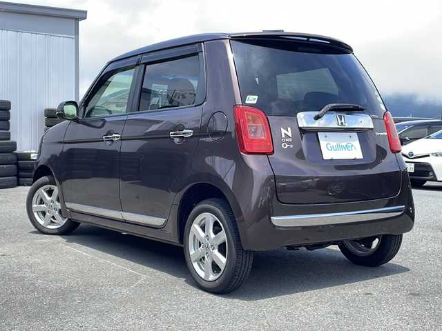 ホンダ Ｎ ＯＮＥ プレミアム 山梨県 2014(平26)年 6.5万km プレミアムディープモカパール 純正メモリナビ（VXM-145C）/・CDAMFMAUX/Bluetooth（電話のみ）/衝突軽減ブレーキ/前後ドラレコ/アイドリングストップ/プッシュスタート/ETC/純正HIDヘッドライト/スマートキー/スタッドレスタイヤ積み込み