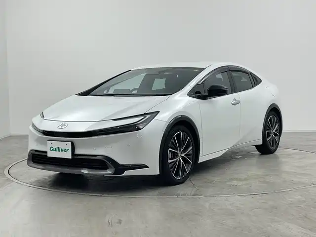 トヨタ プリウス Z 群馬県 2024(令6)年 1.4万km プラチナホワイトパールマイカ 純正１２．３型ナビ　全周囲カメラ　レザーシート　シートヒーター　エアシート　パワーシート　パワーバックドア　置くだけ充電　ドラレコ付きデジタルインナーミラー　ＢＳＭ　ビルトインＥＴＣ２．０　禁煙車