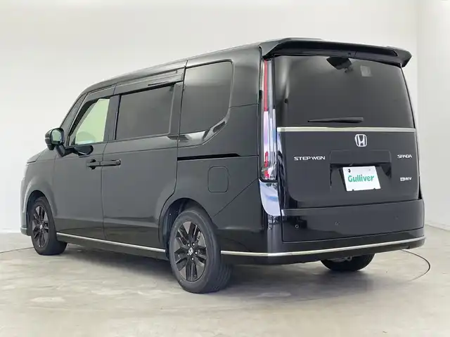 ホンダ ステップワゴン スパーダ eHEV 新潟県 2022(令4)年 6.1万km クリスタルブラックパール 純正メモリナビ/　フルセグTV/Bluetooth/CD/DVD/USB/HDMI/レーダークルーズコントロール/ブラインドスポットインフォメーション/衝突被害軽減ブレーキ/レーンキープアシスト/前後コーナーセンサー/パワーバックドア/ハーフレザーシート/前席シートヒーター/両側パワースライドドア/前後ドライブレコーダー/バックモニター/ビルトインETC/横滑り防止装置/LEDヘッドライト/オートマチックハイビーム/オートライト/パドルシフト/レザーステアリング/ステアリングスイッチ/禁煙車