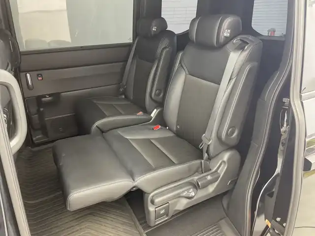 ホンダ ステップワゴン スパーダ eHEV 新潟県 2022(令4)年 6.1万km クリスタルブラックパール 純正メモリナビ/　フルセグTV/Bluetooth/CD/DVD/USB/HDMI/レーダークルーズコントロール/ブラインドスポットインフォメーション/衝突被害軽減ブレーキ/レーンキープアシスト/前後コーナーセンサー/パワーバックドア/ハーフレザーシート/前席シートヒーター/両側パワースライドドア/前後ドライブレコーダー/バックモニター/ビルトインETC/横滑り防止装置/LEDヘッドライト/オートマチックハイビーム/オートライト/パドルシフト/レザーステアリング/ステアリングスイッチ/禁煙車