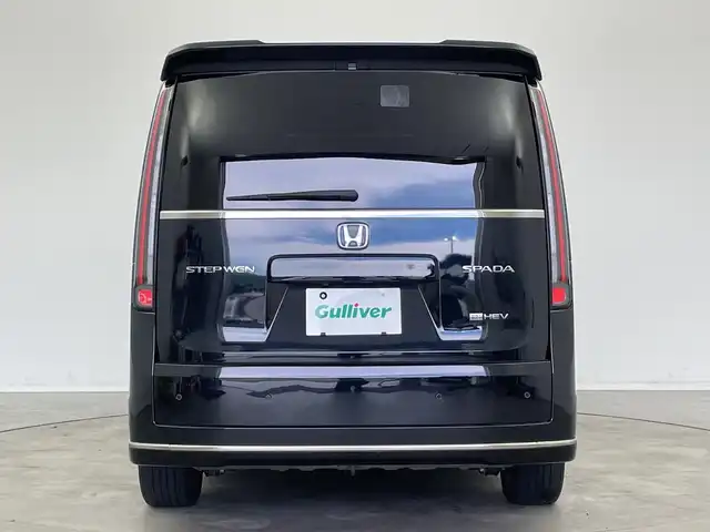 ホンダ ステップワゴン スパーダ eHEV 新潟県 2022(令4)年 6.1万km クリスタルブラックパール 純正メモリナビ/　フルセグTV/Bluetooth/CD/DVD/USB/HDMI/レーダークルーズコントロール/ブラインドスポットインフォメーション/衝突被害軽減ブレーキ/レーンキープアシスト/前後コーナーセンサー/パワーバックドア/ハーフレザーシート/前席シートヒーター/両側パワースライドドア/前後ドライブレコーダー/バックモニター/ビルトインETC/横滑り防止装置/LEDヘッドライト/オートマチックハイビーム/オートライト/パドルシフト/レザーステアリング/ステアリングスイッチ/禁煙車