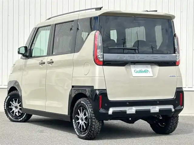 三菱 デリカミニ T プレミアム 群馬県 2024(令6)年 0.2万km ベージュ ワンオ－ナー/純正9型SDナビ【MM223D-LM】/　AM/FM/SD/BTオーディオ/フルセグTV/全方位カメラ/e-アシスト/・衝突軽減ブレーキ/・踏み間違い衝突防止アシスト/・前方衝突予測警報/マイパイロット/・レーダークルーズコントロール/・車線維持支援機能/デジタルルームミラー/前席シートヒーター/ステアリングヒーター/両側パワースライドドア/純正LEDヘッドライト/純正ゴムマット/社外15インチOPEN COUNTRYタイヤ/取扱説明書/保証書/スペアキー1本